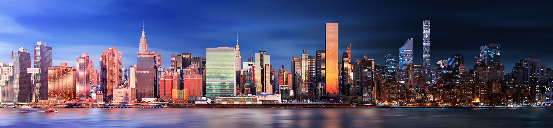 Hybrid photo of the New York City skyline during day and night.