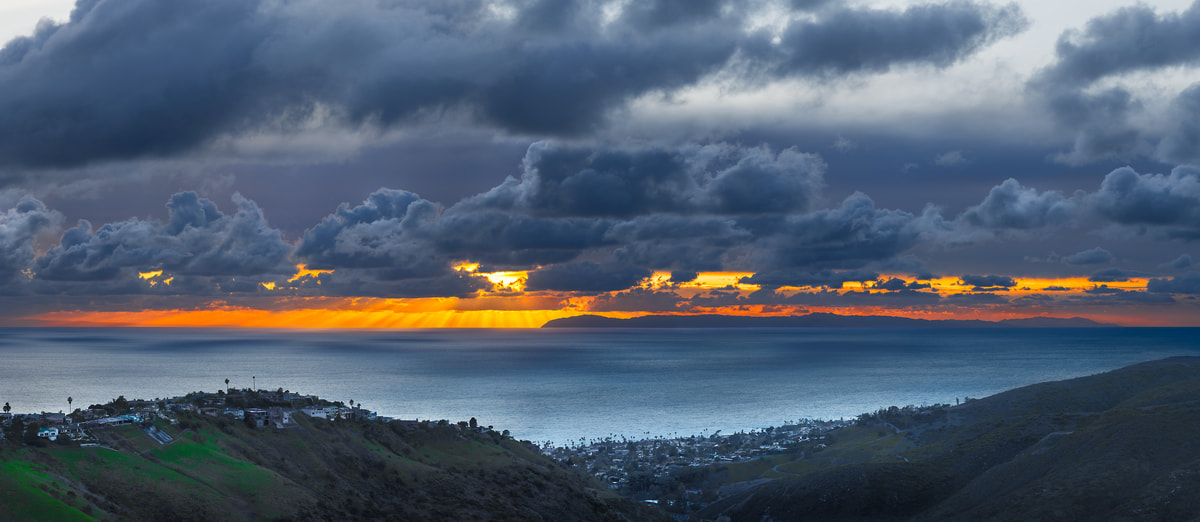 469 megapixels! A very high resolution, large-format VAST photo print of a sunset over the Pacific Ocean with Laguna Beach in the foreground; photograph created by Jim Tarpo in Top of the world, Laguna Beach, California.