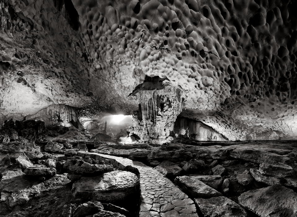 367 megapixels! A very high resolution, black & white photo of a walkway in a cave; photograph created by Peter Rodger in Sung Sot Cave, Ha Long Bay, Vietnam.