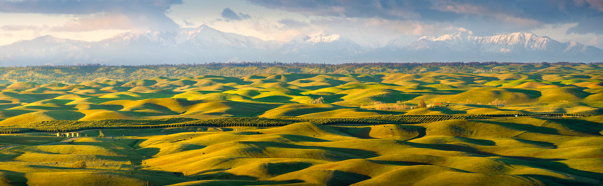 107 megapixels! A very high resolution, large-format VAST photo print of peaceful rolling hills with mountains in the background; landscape photograph created by Jeff Lewis in California.