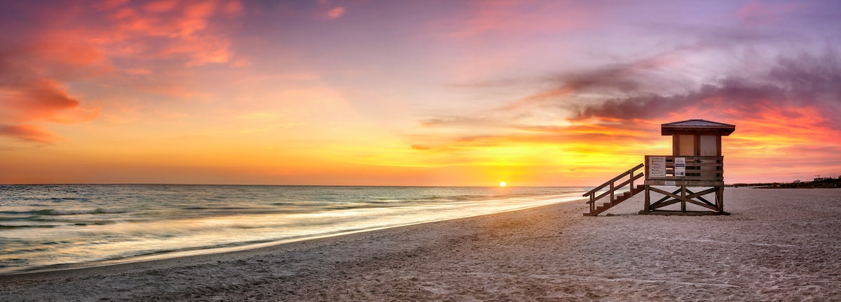 302 megapixels! A very high resolution, large-format VAST photo print of a sunset on a beach with a lifeguard stand; photograph created by Phil Crawshay in Lido Beach, Sarasota, Florida.