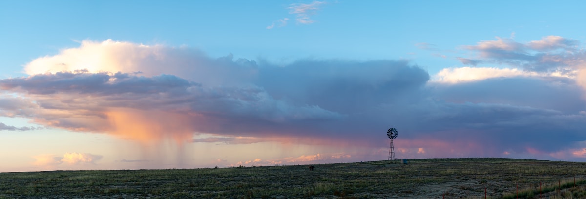 378 megapixels! A very high resolution, large-format VAST photo print of a rural landscape with a windmill and a beautiful sky at sunset; photograph created by Greg Probst in New Mexico.