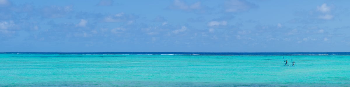 308 megapixels! A very high resolution, large-format VAST photo print of an idyllic seascape with two windsurfers on the turquoise ocean water; photograph created by Assaf Frank in Kralendijk, Bonaire, Caribbean Netherlands.