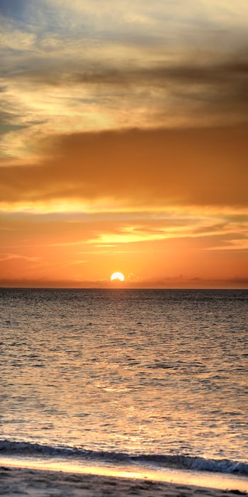 104 megapixels! A very high resolution, large-format VAST photo print of an orange sunset over the ocean; fine art photograph created by Phil Crawshay in Grace Bay, Turks and Caicos Islands.
