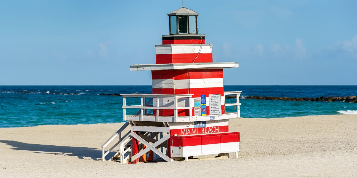 117 megapixels! A very high resolution, large-format VAST photo print of a fun beach scene with a playful-looking lifeguard tower that looks like a lighthouse; photograph created by Beyti Barbaros in South Beach, Miami, Florida.