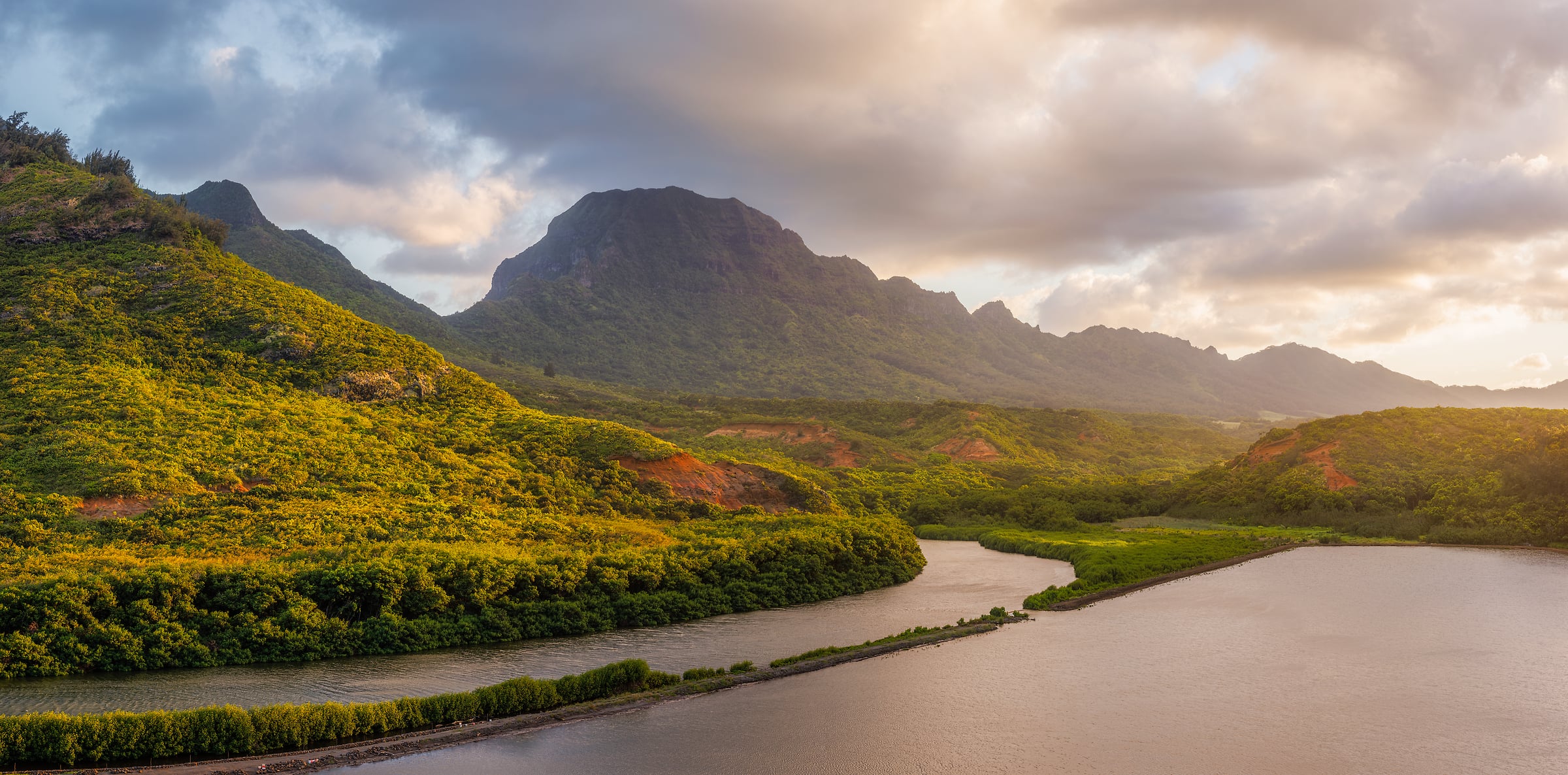 250 megapixels! A very high resolution, large-format VAST photo print of Kauai island in Hawaii at sunset with the Alekoko Fishpond in the foreground and mountains in the background; landscape photograph created by Chris Blake at Menehune Fishpond on Kauai, Hawaii.