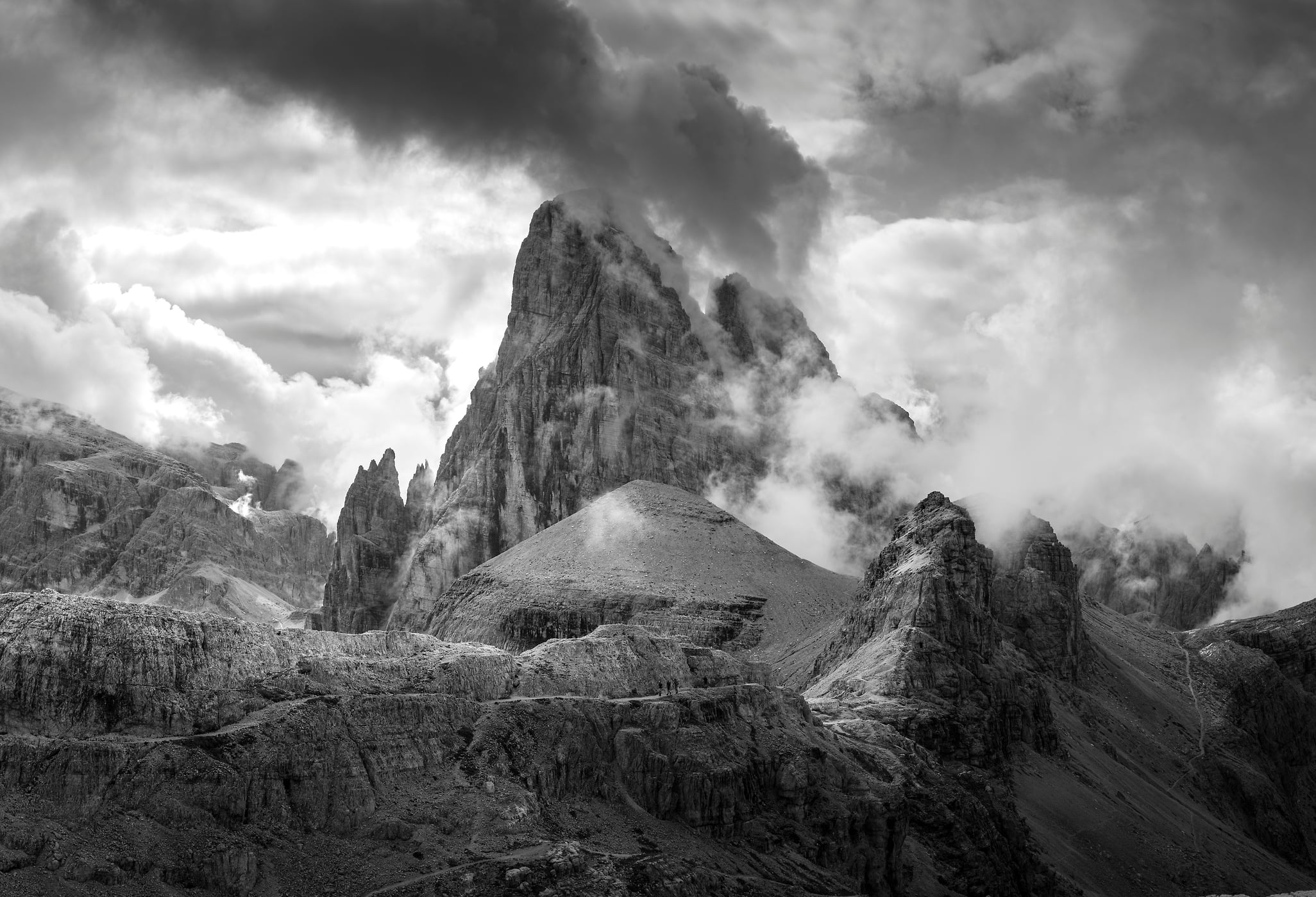 243 megapixels! A very high resolution, large-format black & white photo print of incredible mountains with beautiful clouds swirling around the peaks; fine art photograph created by Jeff Lewis in Sexten Dolomites, Italy.