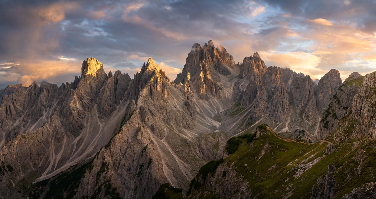 162 megapixels! A very high resolution, large photo print of an impressive mountain range at sunset with the mountain peaks touched by sun rays and backdropped by a beautiful sky; photograph created by Jeff Lewis in the Sexten Dolomites, Italy.