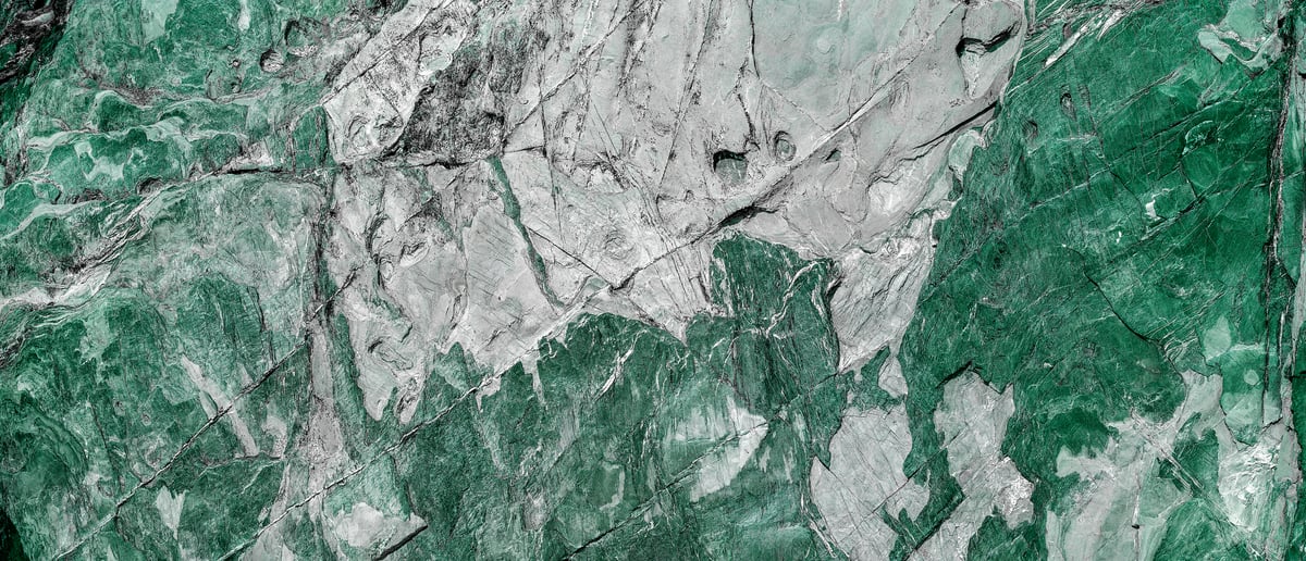 212 megapixels! A very high resolution texture photo of green granite crystalline textures; gigapixel image available to be licensed and downloaded as a digital file from VAST; photograph created by David Lineton.