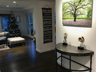 A VAST photo of a nature scene hanging in a home.